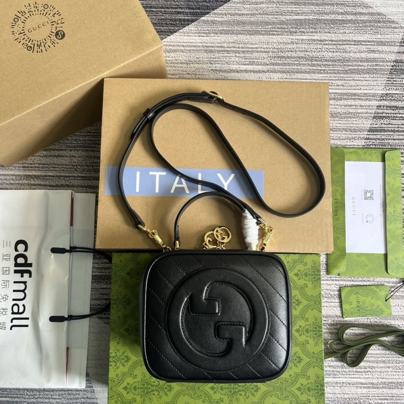 G*u*i top handle bags